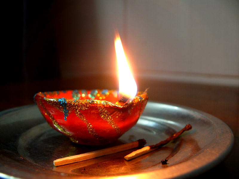 A diya painted by Mira and me, copyright Picturejockey : Navin Harish 2005-2009