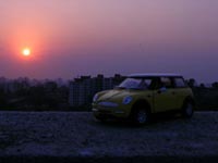Mini Cooper at sunset