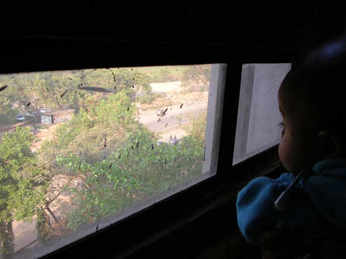 Manuraj looking out og our living room window