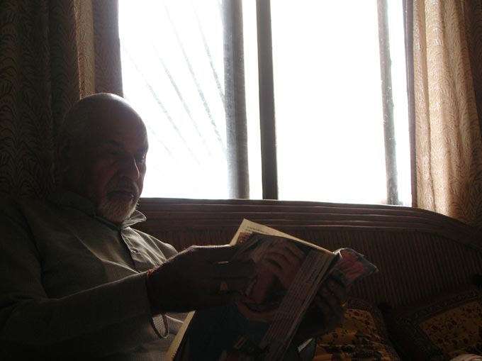 Dad reading magazine