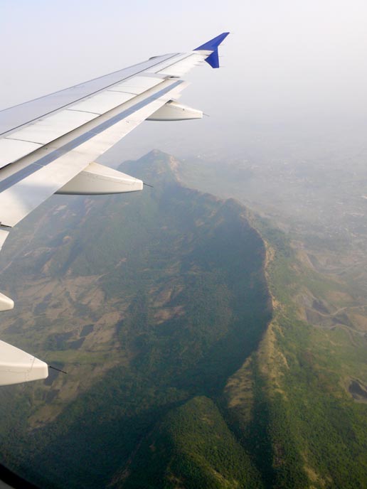I'm back - An image taken from the window of the plane a little before landing in Bombay  | copyright Picturejockey : Navin Harish 2005-2007