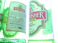 Two is company - An overexposed image of empty bottles of Kingfisher beer