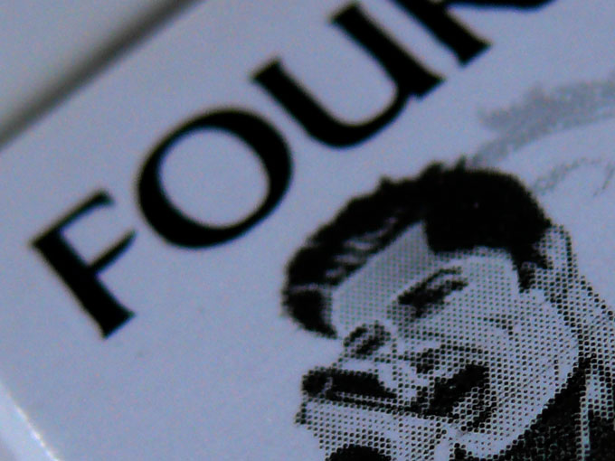 Four - An image of the graphic on the pack of four square cigatettes | copyright Picturejockey : Navin Harish 2005-2007