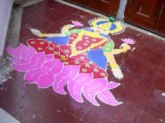 Godess Laxmi and Rangoli - An image of a Godess Laxmi rangoli made by our neighbour on Diwali | copyright Picturejockey : Navin Harish 2005-2007