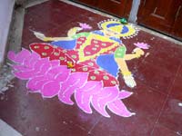 Godess Laxmi and Rangoli - An image of a Godess Laxmi rangoli made by our neighbour on Diwali