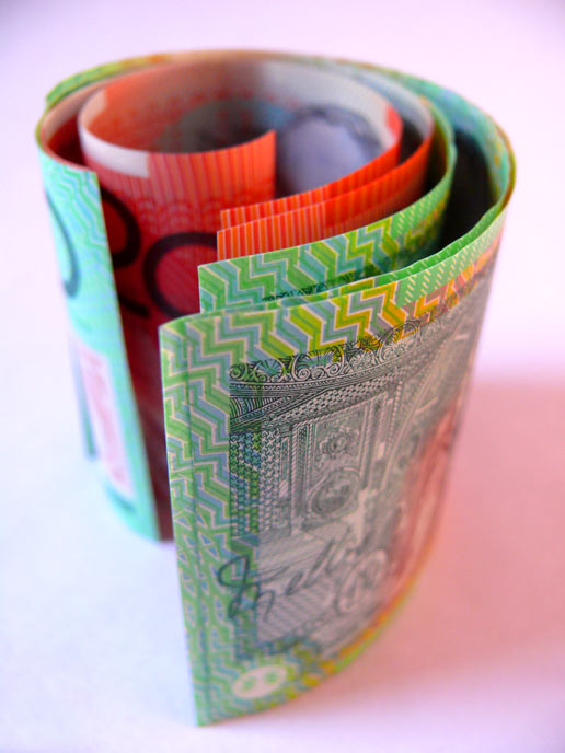 Let's print our own money - an image of rolled up Australian Dollars | copyright Picturejockey : Navin Harish 2005-2007