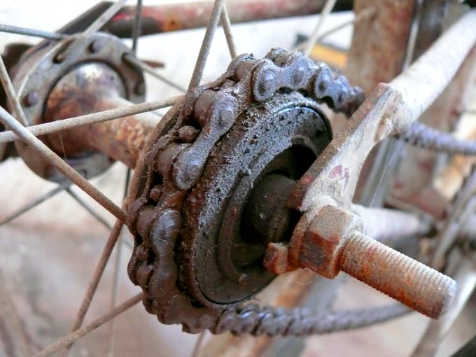 Flywheel - An image of a flywheel of a bicycle parked in our stairwell | copyright Picturejockey : Navin Harish 2005-2007