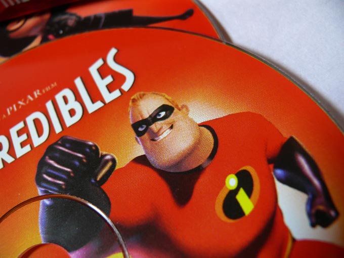 Click here for bigger version. Ever wished you were a Superhero? - An image of the Video CDs of Pixar's animated movie The Incredibles | copyright Picturejockey : Navin Harish 2005-2007