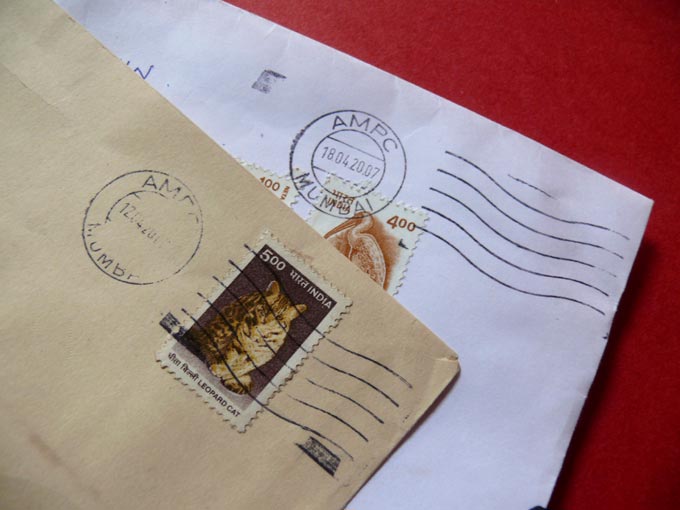 Express delivery - An image of letter with postage stamps  | copyright Picturejockey : Navin Harish 2005-2007