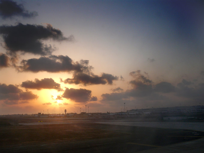 Click here for bigger version. Sunset at Chhatrapati Shivaji Airport, Mumbai - An image of Sunset taken from the ariplane at Chhatrapati Shivaji Airport just before take off | copyright Picturejockey : Navin Harish 2005-2007