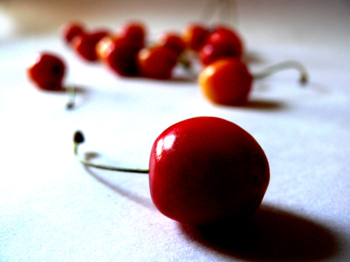 It's a cherry...no it is a pumpkin in disguise - An image of cherries | copyright Picturejockey : Navin Harish 2005-2007