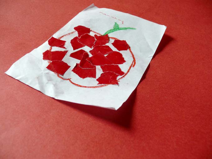 My Apple - An image of an apple made by pasting small red pieces of paper | copyright Picturejockey : Navin Harish 2005-2007