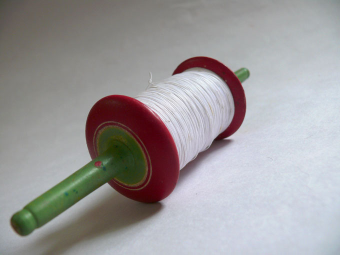 Dor  - An image a spool and thread used for flying kites | copyright Picturejockey : Navin Harish 2005-2007