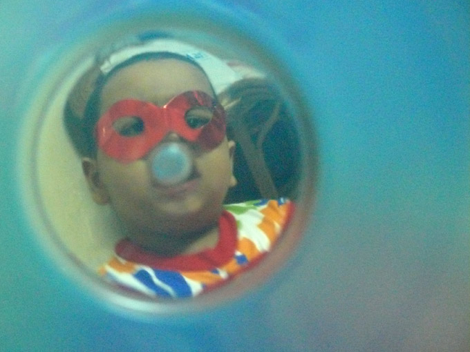 Through tinted glasses - An image of Manu wearing party glasses | copyright Picturejockey : Navin Harish 2005-2007