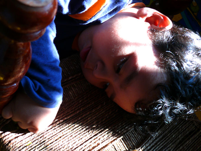 Guarding my treasure - An image of Manu and baloons hidden by him  | copyright Picturejockey : Navin Harish 2005-2008