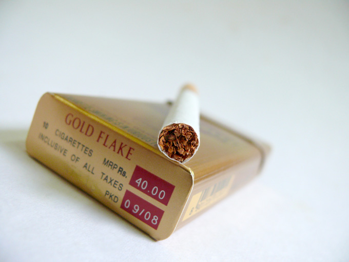Smoking... Alcohol... Prejudice... The whole truth - An image of a pack of Gold Flake cigarette | copyright Picturejockey : Navin Harish 2005-2008
