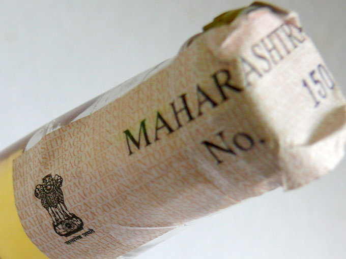 A Jew in Nazi Germany - An image of the neck of corona beer with the excise tag of Maharashtra government | copyright Picturejockey : Navin Harish 2005-2008