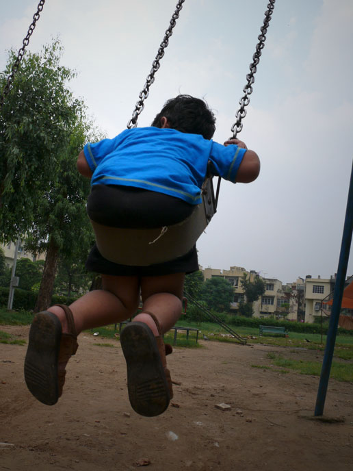 Here I come... Here I go - An image of Manu on a swing the park near my home in Delhi | copyright Picturejockey : Navin Harish 2005-2008