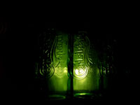 United we stand - An image of Carlsberg bottles in dark