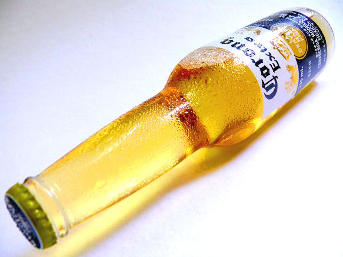 Corona is back - A bottle of Corona beer  , copyright Picturejockey : Navin Harish 2005-2008