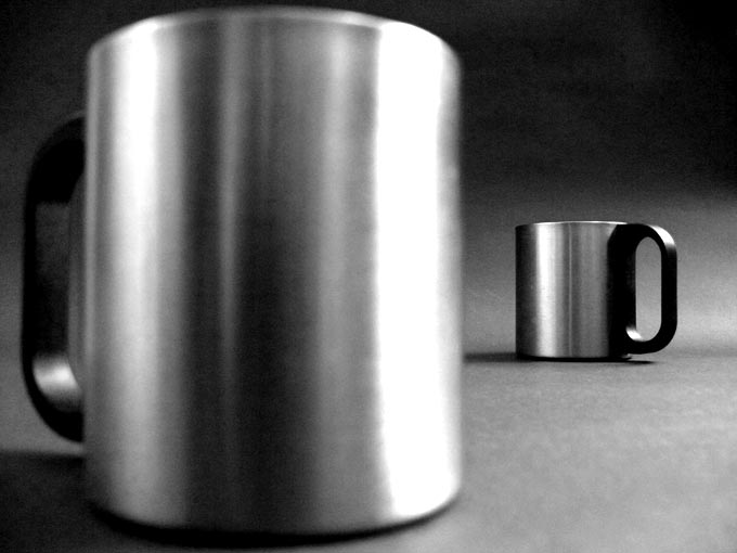 One for me and one for my dad - An image of two steel coffee mugs | copyright Picturejockey : Navin Harish 2005-2008