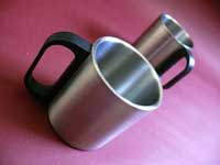 Ek galassi, do galassi, teen galassi, chaar...  - An image of two steel coffee mugs