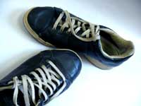 Dad, I have fixed your shoe laces - An image of my shoes after Manu has fixed the shoe laces