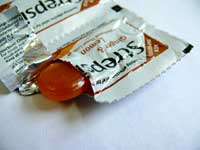 Let me check your pockets - An image of strepsils, a brand of lozenges