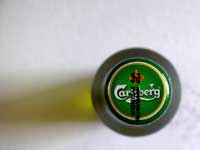 Carlsberg's top - An image of a bottle of Carlsberg beer from top
