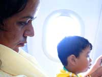 An absorbing read - An image of Mira and Manu on board the plane from Bombay to Delhi