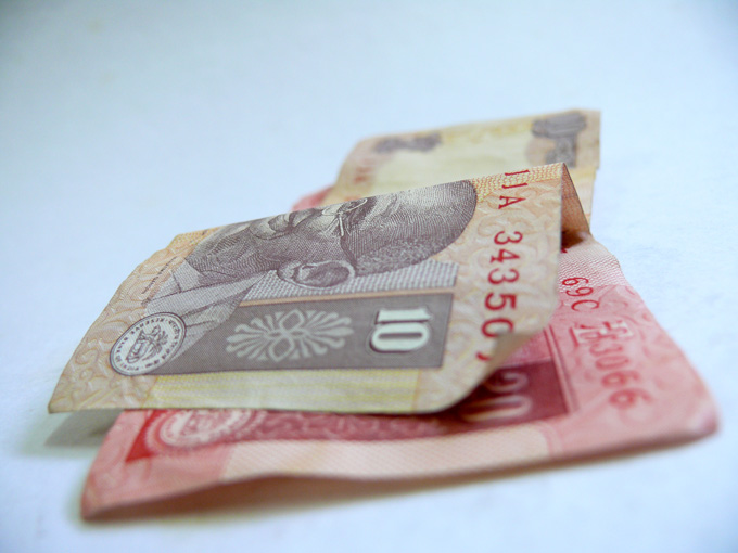 Ten and Twenty ruppes notes of Indian currency , copyright Picturejockey : Navin Harish 2005-2009