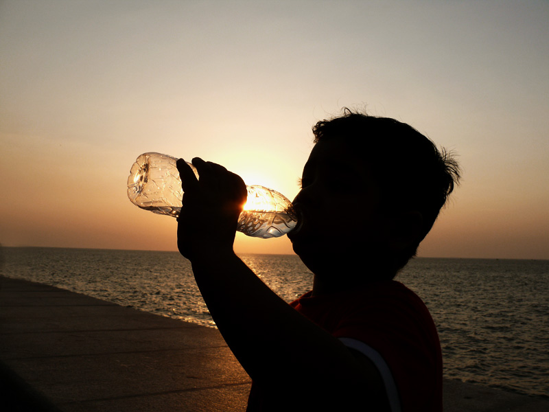 Manu sipping water from a bottle at Marine Drive, copyright Picturejockey : Navin Harish 2005-2009