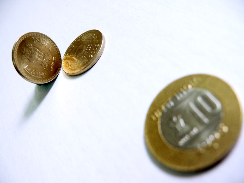 New 5 rupee and 10 rupee coins, copyright Picturejockey : Navin Harish 2005-2009