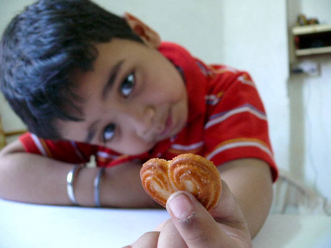 Manu with a Little Heart biscuit , copyright Picturejockey : Navin Harish 2005-2009
