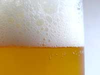 Bubbles in my beer : A closeup shot of a beer glass