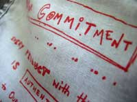 Commitment - Part of the text printed on the pocket of a Levi's trousers