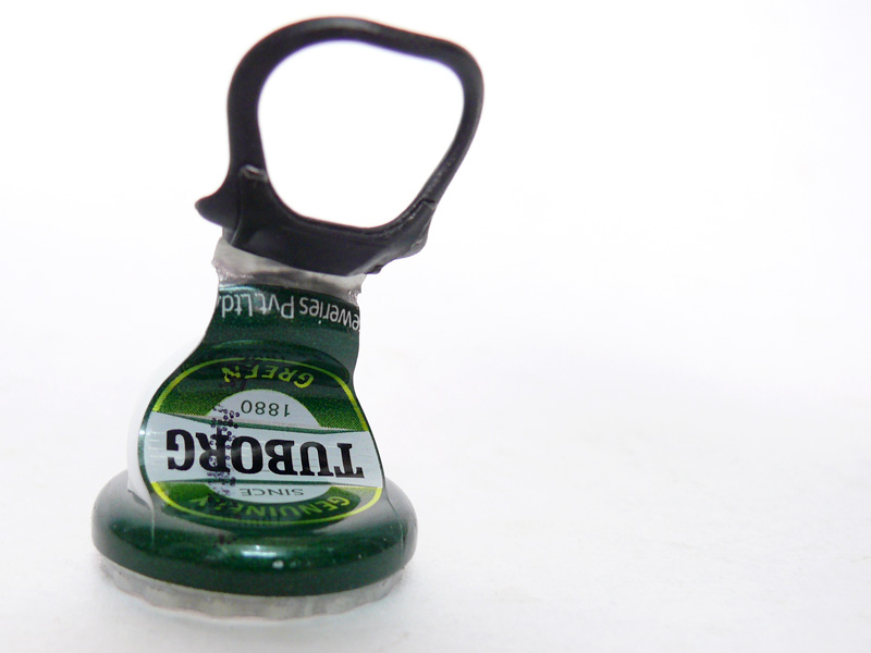 The pull away cap of Tuborg beer , copyright Picturejockey : Navin Harish 2005-2009