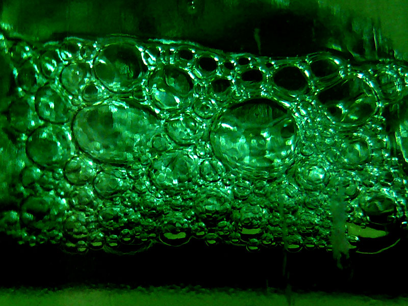 Bubbles in the bottle of Tuborg beer , copyright Picturejockey : Navin Harish 2005-2009