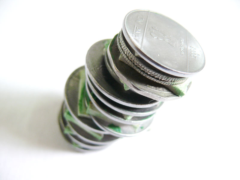 A tower of coins and two way tape made by Manuraj, copyright Picturejockey : Navin Harish 2005-2009