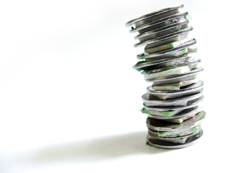 A tower of coins and two way tape made by Manuraj, copyright Picturejockey : Navin Harish 2005-2009