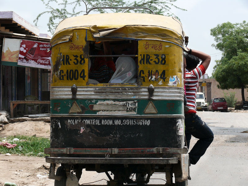 An over loaded rickshaw in Faridabad, Haryana, copyright Picturejockey : Navin Harish 2005-2009