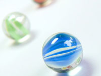 And the history repeats itself - A macro of four marbles