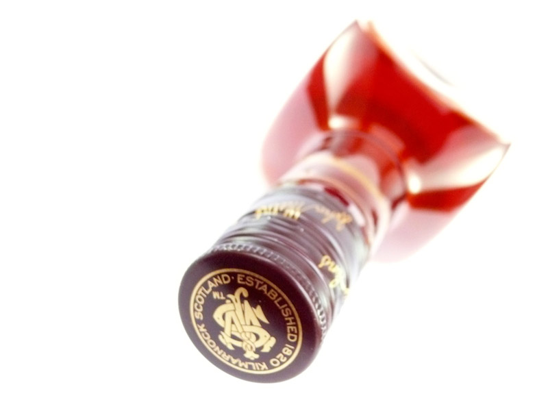 Macro of a bottle of Johnnie Walker Whisky Square peg in a square hole, copyright Picturejockey : Navin Harish 2005-2013